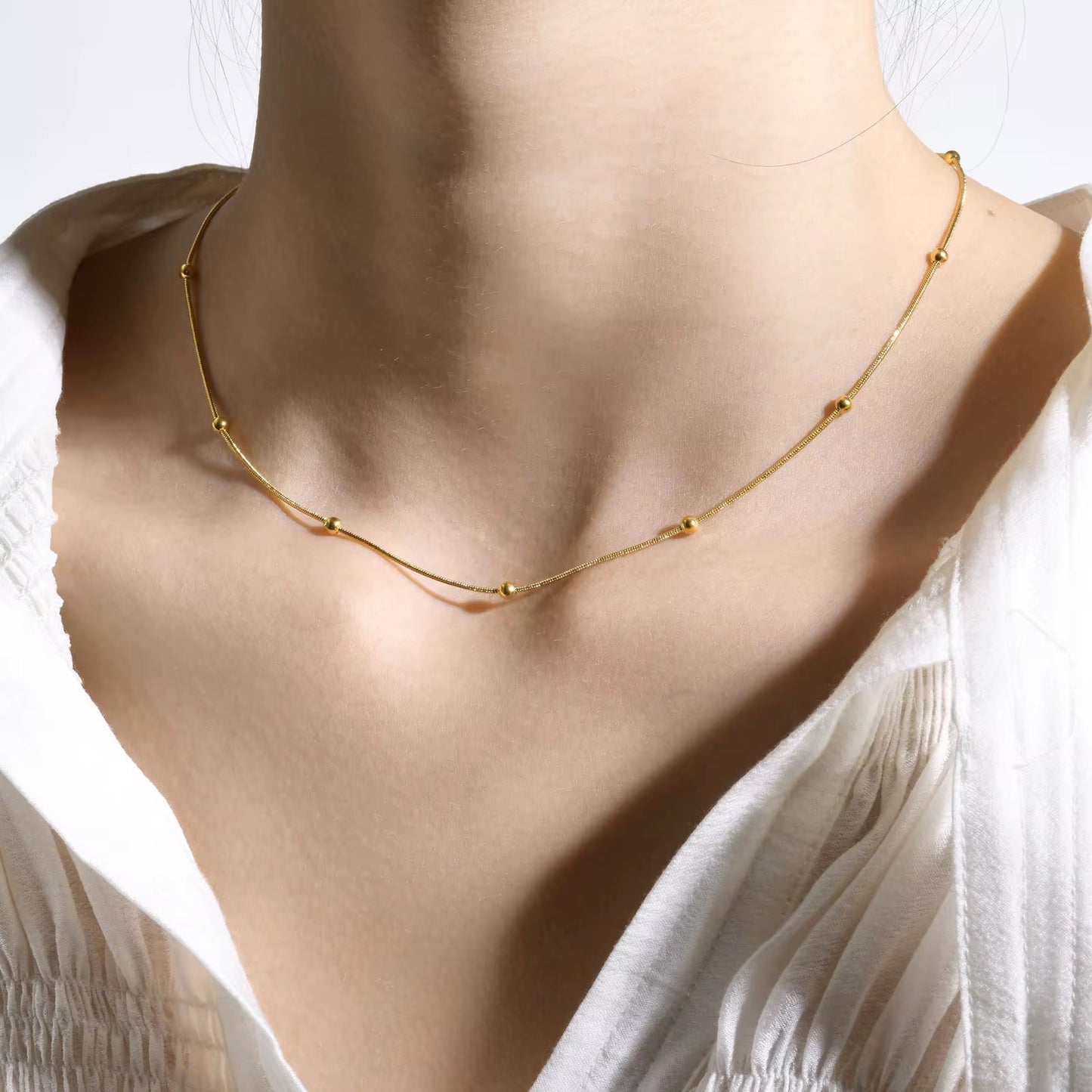Stålhalsband med 18K förgyllning 40+6 cm