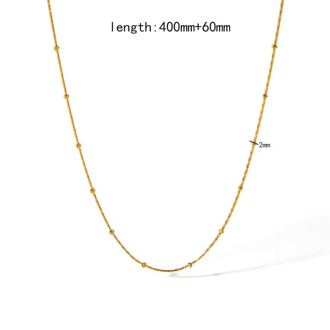 Stålhalsband med 18K förgyllning 40+6 cm