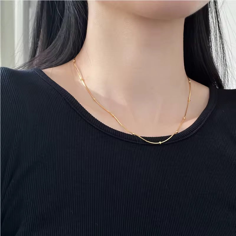 Stålhalsband med 18K förgyllning 40+6 cm