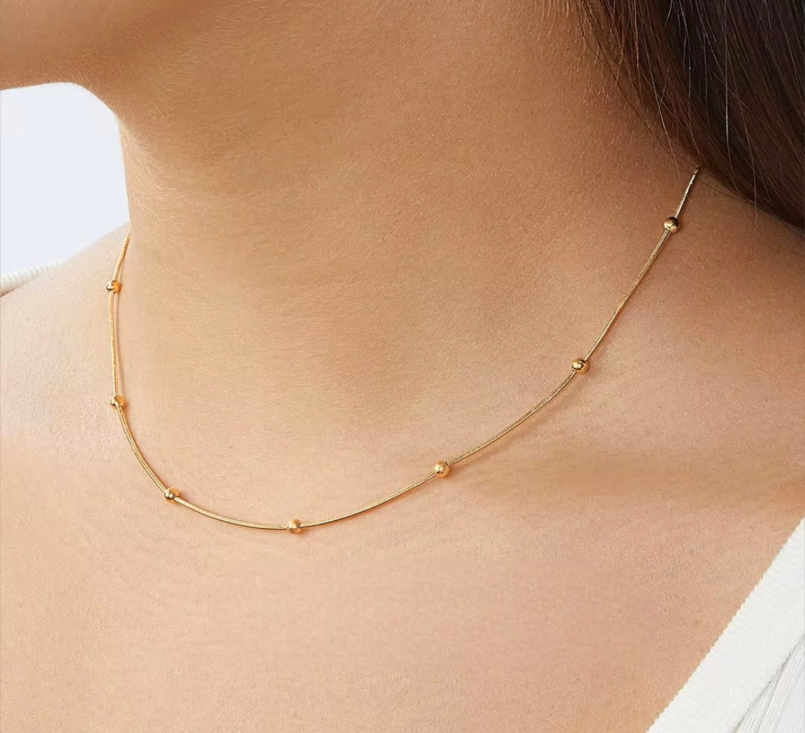 Stålhalsband med 18K förgyllning 40+6 cm