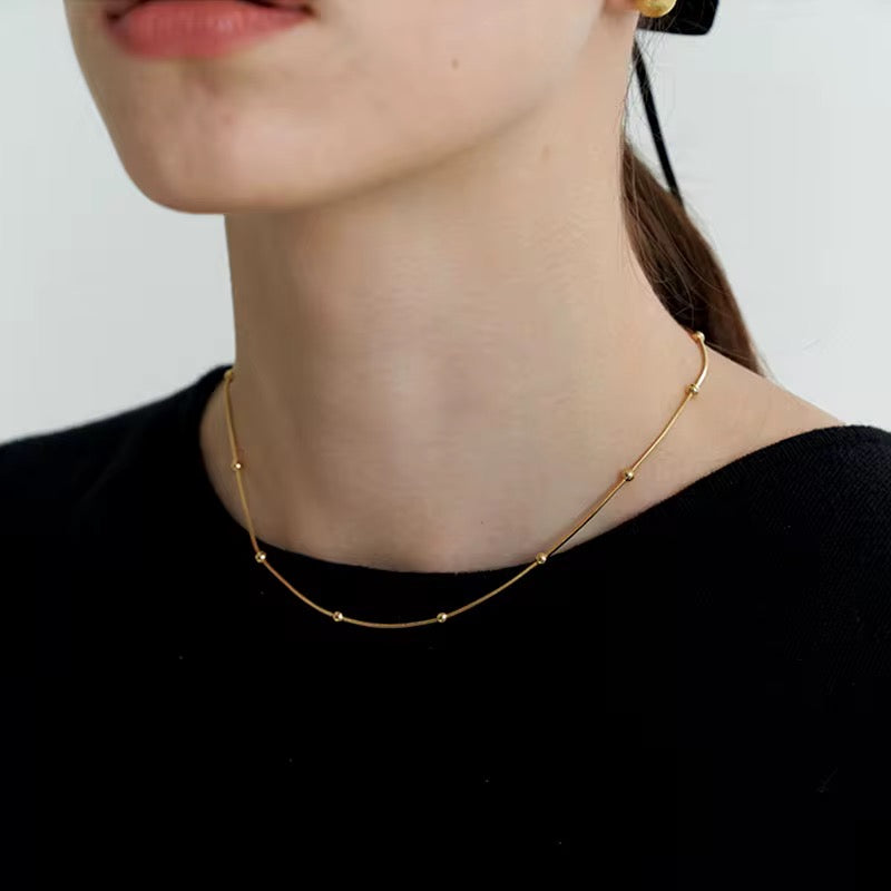 Stålhalsband med 18K förgyllning 40+6 cm