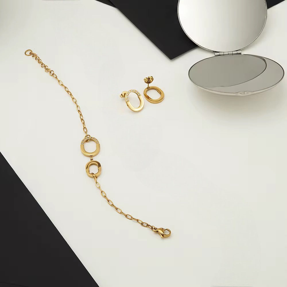 Stålörhängen med 18K förgyllning och CZ 15MM