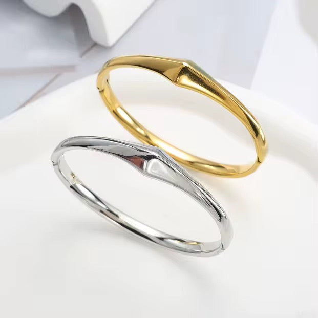 Stålarmring med 18K förgyllning 6MM